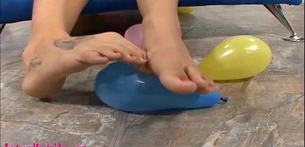  popping ballons with feet gets cum on feet